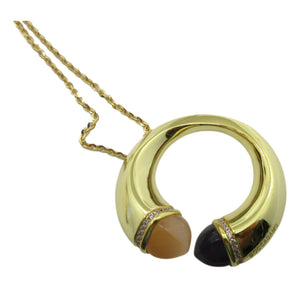 <i>Kissing Circle Pendant Necklace</i><br>Made in Italy<br>