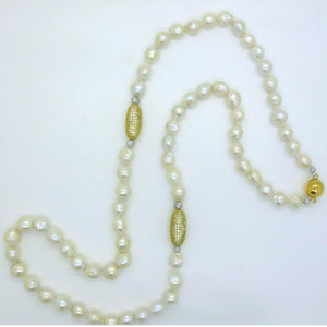 <i>Baroque Pearl Rope Necklace</i><br>by Marti Rosenburgh</i>